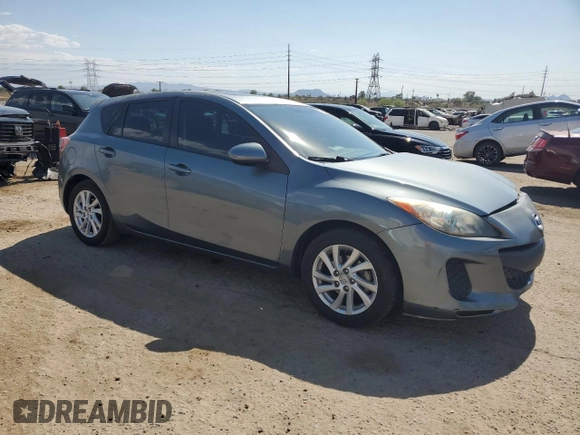 2012 Mazda 3 i Touring with VIN JM1BL1L7XC1534992, listed as a Copart auction lot 63142035 with 122,952 mi miles and Salvage title. Bid and sale history available at DreamBid. Image 4.