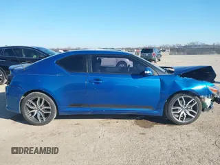 2014 Scion tC with VIN JTKJF5C78E3079618, listed as a IAAI auction lot 41107330 with 112,105 mi miles. Bid and sale history available at carsss.com. Image 14.