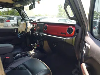 2021 Jeep Gladiator Rubicon with VIN 1C6JJTBG2ML515932, listed as a IAAI auction lot 42471704 with 57,775 mi miles and . Bid and sale history available at DreamBid. Image 5.