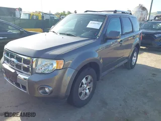 2011 Ford Escape Limited with VIN 1FMCU0EG0BKA82063, listed as a IAAI auction lot 41993781 with 156,991 mi miles. Bid and sale history available at carsss.com. Image 2.