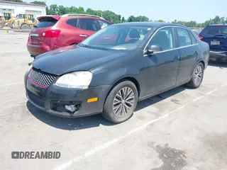 2009 Volkswagen Jetta SE with VIN 3VWRM71K79M166916, listed as a IAAI auction lot 42400659 with 166,061 mi miles and . Bid and sale history available at DreamBid. Image 2.