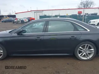 2016 Audi A8 L 4.0T Sport with VIN WAU43AFD3GN020763, listed as a IAAI auction lot 41951858 with 104,563 mi miles. Bid and sale history available at carsss.com. Image 15.