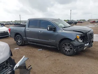 2021 Nissan Titan SV z VIN 1N6AA1EF8MN536575, wystawiony jako IAAI lot #42079874 z przebiegiem 45 332 mil mil oraz . Historia ofert i sprzedaży dostępna na DreamBid. Obrazek 1.