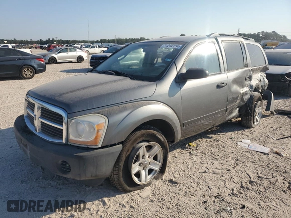 2005 Dodge Durango SXT with VIN 1D4HD38K35F512020, listed as a Copart auction lot 74292234 with 164,075 mi miles and Salvage title. Bid and sale history available at DreamBid. Image 1.