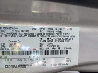 2018 Ford Focus SE with VIN 1FADP3FE8JL256698, listed as a IAAI auction lot 41757179 with 118,498 mi miles. Bid and sale history available at carsss.com. Image 9.