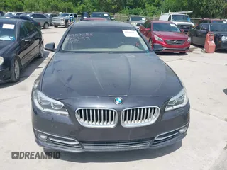 2014 BMW 5 Series 535i with VIN WBA5B1C51ED475795, listed as a IAAI auction lot 42028184 with 119,692 mi miles. Bid and sale history available at carsss.com. Image 12.