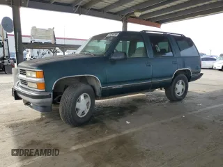 1996 Chevrolet Tahoe z VIN 1GNEK13RXTJ393141, wystawiony jako Copart lot #43256455 z przebiegiem 270 108 mil mil oraz Czysty tytuł • Clean title. Historia ofert i sprzedaży dostępna na DreamBid. Obrazek 1.