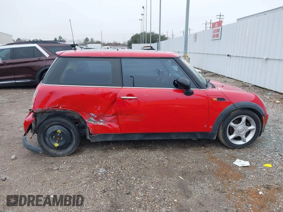 2003 MINI Hardtop with VIN WMWRC33413TC48601, listed as a IAAI auction lot 41418901 with 57,095 mi miles and . Bid and sale history available at DreamBid. Image 14.