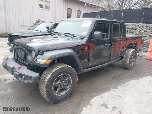 2022 Jeep Gladiator Rubicon with VIN 1C6JJTBG2NL153568, listed as a IAAI auction lot 41601159 with 32,862 mi miles. Bid and sale history available at carsss.com. Image 2.