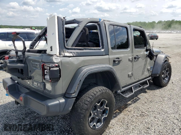 2022 Jeep Wrangler Unlimited Rubicon with VIN 1C4JJXR69NW206276, listed as a Copart auction lot 55247595 with 39,273 mi miles and Salvage title. Bid and sale history available at DreamBid. Image 3.