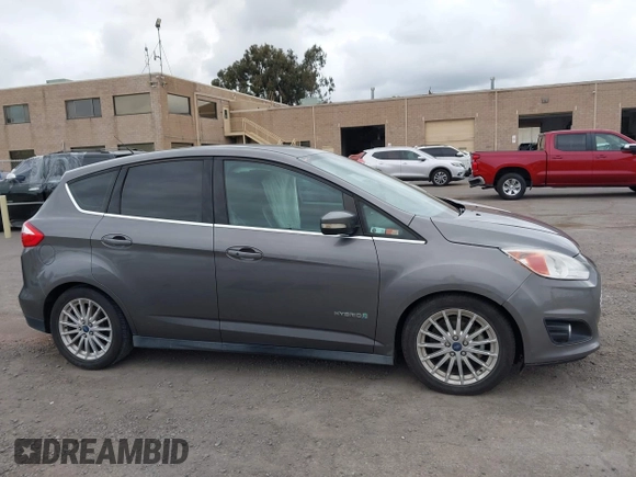 2013 Ford C-Max SEL z VIN 1FADP5BU2DL543029, wystawiony jako IAAI lot #42115325 z przebiegiem 131 855 mil mil oraz . Historia ofert i sprzedaży dostępna na DreamBid. Obrazek 13.