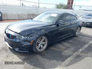 2014 BMW 4 Series 428i with VIN WBA3N7C55EF719504, listed as a IAAI auction lot 41403957 with 98,882 mi miles and . Bid and sale history available at carsss.com. Image 17.