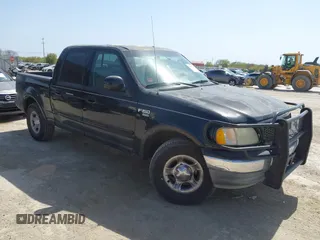 2003 Ford F-150 XLT with VIN 1FTRW07L53KC01651, listed as a IAAI auction lot 41827007 with 233,842 mi miles and . Bid and sale history available at DreamBid. Image 1.