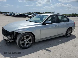 2015 BMW 3 Series 320i with VIN WBA3B1G51FNT64659, listed as a Copart auction lot 51007935 with 99,495 mi miles and Salvage Title. Bid and sale history available at carsss.com. Image 1.