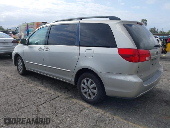2004 Toyota Sienna CE with VIN 5TDZA23C04S032956, listed as a IAAI auction lot 42121153 with 218,908 mi miles. Bid and sale history available at carsss.com. Image 3.