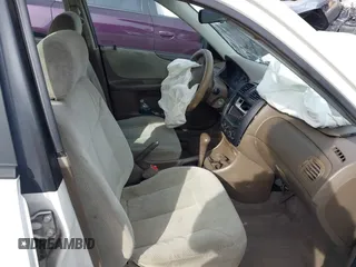 2000 Mazda Protege DX with VIN JM1BJ2221Y0208156, listed as a IAAI auction lot 41609657 with 435,304 mi miles and . Bid and sale history available at DreamBid. Image 5.