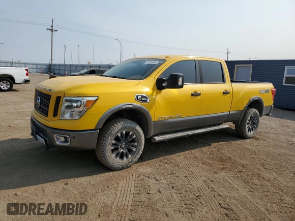 2016 Nissan Titan XD PRO-4X with VIN 1N6BA1F43GN506115, listed as a Copart auction lot 74916444 with 157,268 mi miles and Salvage Title. Bid and sale history available at carsss.com. Image 1.