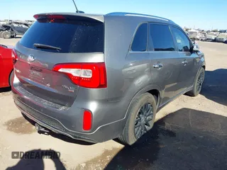 2014 Kia Sorento SX with VIN 5XYKW4A75EG457768, listed as a IAAI auction lot 41388412 with 129,691 mi miles. Bid and sale history available at carsss.com. Image 4.