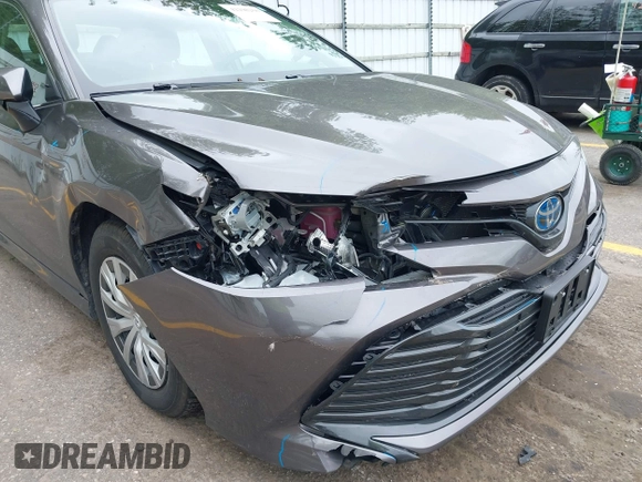2019 Toyota Camry Hybrid LE z VIN 4T1B31HK4KU511360, wystawiony jako IAAI lot #42298260 z przebiegiem 133 019 mil mil oraz . Historia ofert i sprzedaży dostępna na DreamBid. Obrazek 6.