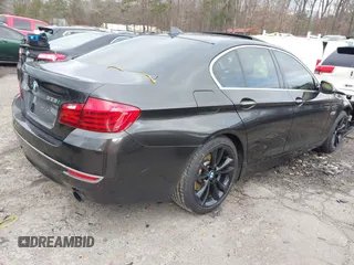 2014 BMW 5 Series 535i with VIN WBA5B1C51ED480639, listed as a IAAI auction lot 41257379 with Not Provided miles. Bid and sale history available at carsss.com. Image 4.