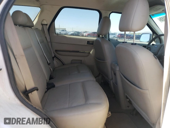 2008 Ford Escape XLT с VIN 1FMCU03128KC70462, выставлен на аукционе Copart как лот 57118055 с пробегом 215 790 миль миль и Списание • Salvage title. История ставок и продаж доступна на DreamBid. Изображение 11.