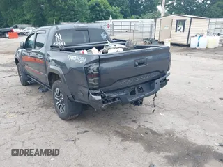 2022 Toyota Tacoma SR with VIN 3TMCZ5AN2NM507478, listed as a IAAI auction lot 42425907 with 40,796 mi miles and . Bid and sale history available at DreamBid. Image 3.