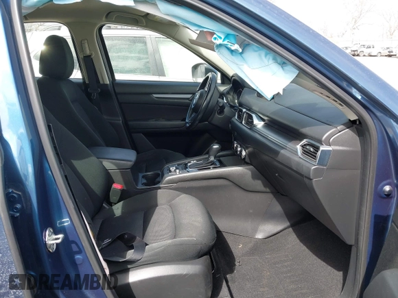 2018 Mazda CX-5 Sport with VIN JM3KFBBM8J0400741, listed as a IAAI auction lot 41860323 with 54,911 mi miles. Bid and sale history available at carsss.com. Image 5.