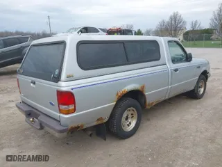 1997 Ford Ranger XL with VIN 1FTCR10U8VPA00709, listed as a IAAI auction lot 42071941 with 153,501 mi miles. Bid and sale history available at carsss.com. Image 4.