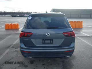 2021 Volkswagen Tiguan S with VIN 3VV1B7AX8MM016874, listed as a IAAI auction lot 41633090 with 76,857 mi miles and . Bid and sale history available at DreamBid. Image 16.
