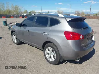 2009 Nissan Rogue S with VIN JN8AS58VX9W440060, listed as a IAAI auction lot 42067756 with 117,849 mi miles. Bid and sale history available at carsss.com. Image 3.