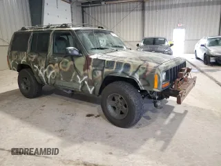 1998 Jeep Cherokee Sport with VIN 1J4FJ68S7WL269467, listed as a Copart auction lot 58664135 with 187,741 mi miles and Clean title. Bid and sale history available at DreamBid. Image 4.