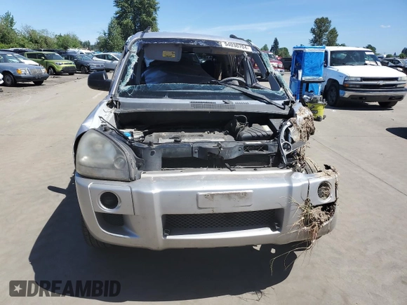 2005 Hyundai Tucson GL with VIN KM8JM12B25U076246, listed as a Copart auction lot 54030704 with 0 mi miles and Salvage Title. Bid and sale history available at carsss.com. Image 5.
