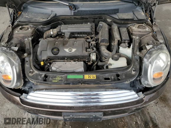 2010 MINI Convertible with VIN WMWMR3C50ATU97547, listed as a Copart auction lot 44780185 with 91,194 mi miles and Salvage Title. Bid and sale history available at DreamBid. Image 11.