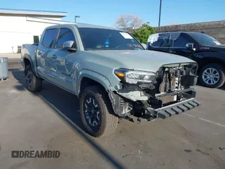 2023 Toyota Tacoma 4WD SR with VIN 3TYCZ5AN4PT123631, listed as a IAAI auction lot 41978865 with 24,445 mi miles. Bid and sale history available at carsss.com. Image 1.