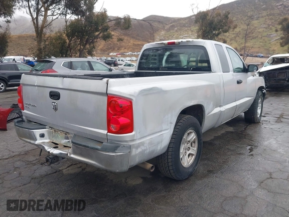 2005 Dodge Dakota SLT with VIN 1D7HE42K05S231198, listed as a IAAI auction lot 41552349 with 149,915 mi miles and . Bid and sale history available at carsss.com. Image 4.