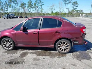 2008 Suzuki SX4 Convenience with VIN JS2YC415285110998, listed as a IAAI auction lot 41772963 with 172,908 mi miles and . Bid and sale history available at DreamBid. Image 14.
