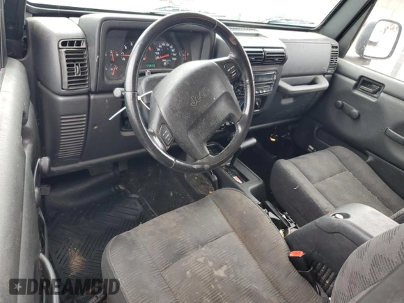 2003 Jeep Wrangler Sport with VIN 1J4FA49S43P321998, listed as a Copart auction lot 60860444 with 109,856 mi miles and Salvage Title. Bid and sale history available at carsss.com. Image 8.