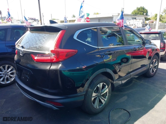 2017 Honda CR-V LX with VIN 7FARW5H30HE004035, listed as a IAAI auction lot 41836393 with 212,574 mi miles. Bid and sale history available at carsss.com. Image 4.