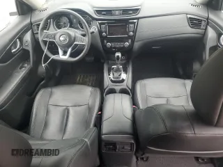 2018 Nissan Rogue SV z VIN 5N1AT2MV8JC852721, wystawiony jako Copart lot #58755385 z przebiegiem 69 454 mil mil oraz Szkoda całkowita • Salvage title. Historia ofert i sprzedaży dostępna na DreamBid. Obrazek 8.