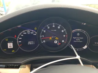 2022 Porsche Cayenne z VIN WP1AA2AY0NDA04856, wystawiony jako Copart lot #55302755 z przebiegiem 43 310 mil mil oraz Szkoda całkowita • Salvage title. Historia ofert i sprzedaży dostępna na DreamBid. Obrazek 9.