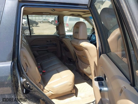 2005 Honda Pilot EX-L with RES with VIN 5FNYF18645B027534, listed as a IAAI auction lot 42016295 with 216,658 mi miles. Bid and sale history available at carsss.com. Image 8.