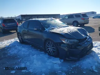 2014 Scion tC with VIN JTKJF5C73E3067053, listed as a IAAI auction lot 41294488 with 122,360 mi miles. Bid and sale history available at carsss.com. Image 1.