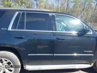 2015 GMC Yukon SLE with VIN 1GKS2AKC4FR720667, listed as a IAAI auction lot 41822277 with 134,984 mi miles and . Bid and sale history available at DreamBid. Image 14.