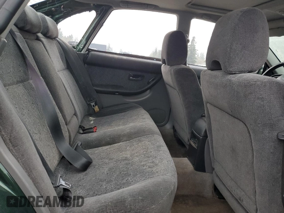 2000 Subaru Legacy with VIN 4S3BE6453Y7215569, listed as a Copart auction lot 81493564 with 218,045 mi miles and Salvage title. Bid and sale history available at DreamBid. Image 10.