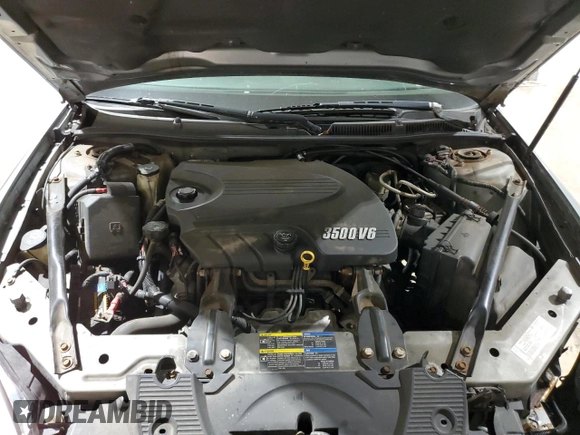 2007 Chevrolet Impala LS z VIN 2G1WB58KX79206085, wystawiony jako Copart lot #58225465 z przebiegiem 97 777 mil mil oraz Szkoda całkowita • Salvage title. Historia ofert i sprzedaży dostępna na DreamBid. Obrazek 11.