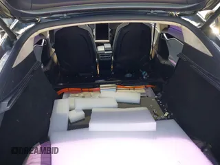 2013 Tesla Model S Performance z VIN 5YJSA1DP9DFP06121, wystawiony jako IAAI lot #42511097 z przebiegiem 100 990 mil mil oraz . Historia ofert i sprzedaży dostępna na DreamBid. Obrazek 6.