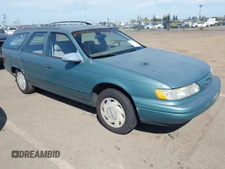 1993 Ford Taurus z VIN 1FACP57U0PG254152, wystawiony jako IAAI lot #42014759 z przebiegiem 22 454 mil mil oraz . Historia ofert i sprzedaży dostępna na DreamBid. Obrazek 1.