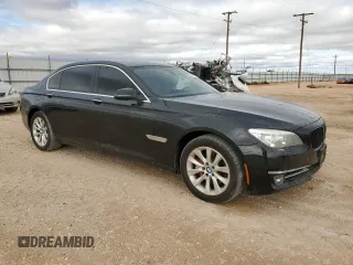 2015 BMW 7 Series 740Li xDrive with VIN WBAYF4C50FGS99289, listed as a Copart auction lot 79809474 with 128,993 mi miles and Salvage Title. Bid and sale history available at carsss.com. Image 4.