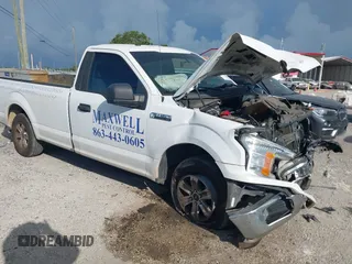 2019 Ford F-150 XL with VIN 1FTMF1CB3KKD35652, listed as a IAAI auction lot 42463370 with 96,129 mi miles and . Bid and sale history available at DreamBid. Image 1.