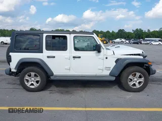2018 Jeep Wrangler Unlimited Sport с VIN 1C4HJXDG2JW127282, выставлен на аукционе IAAI как лот 42188212 с пробегом 51 902 миль миль и . История ставок и продаж доступна на DreamBid. Изображение 14.